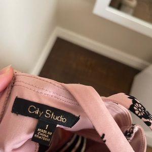 Pretty dress in perfect condition.  Wearing once on hoco